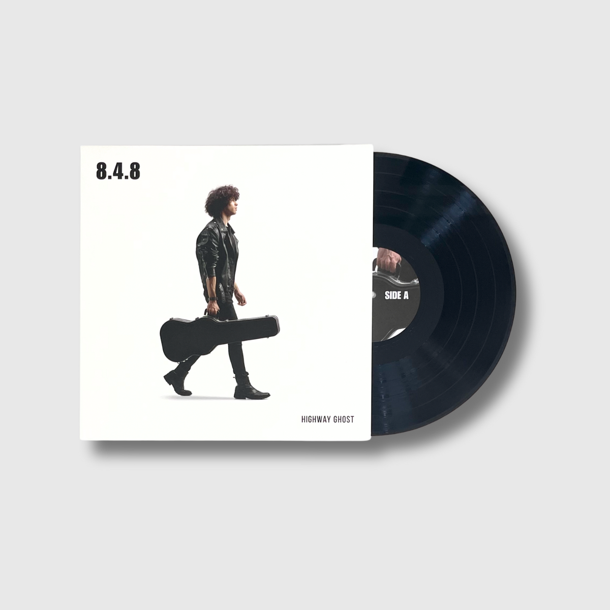 Custom cut vinyl record with cover featuring a person holding a guitar case on a light grey background